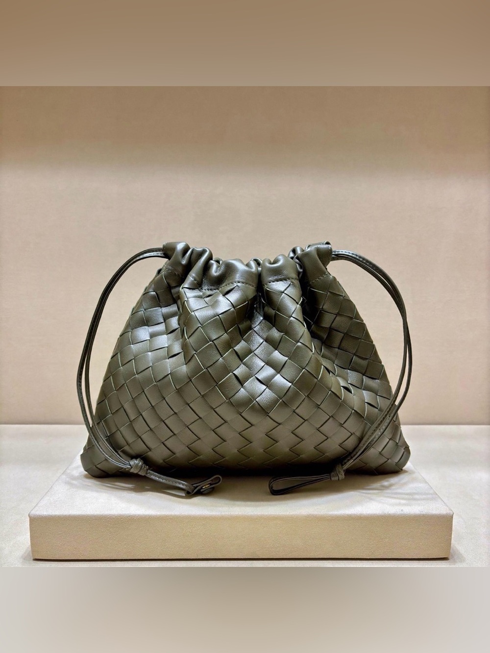 Leather Woven Drawstring Purse in Olive Green - Picture 1 of 6